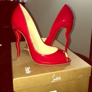 Christian Louboutin Vibrant Red Curved Heel Pumps